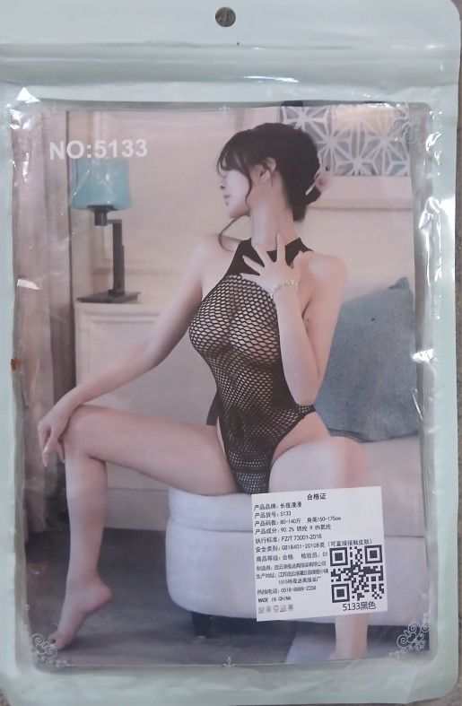 Fishnet body suit one size fits all