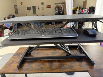 Desktop with adjustable height