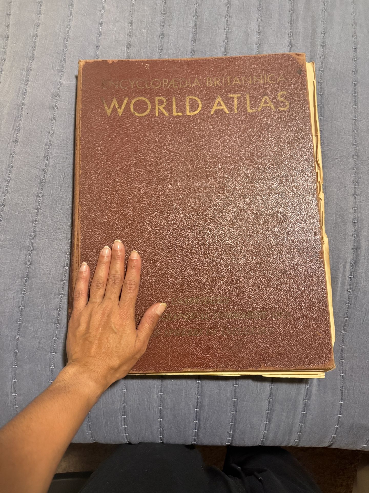Antique World Atlas And Old Newspaper