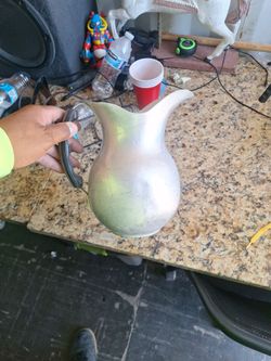 Vintage aluminum pitchers