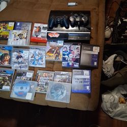 PS3  Two Controllers, And A Bunch Of Games