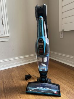 New Unused Bissell Cordless Pet, 3061 Featherweight Stick Vacuum
