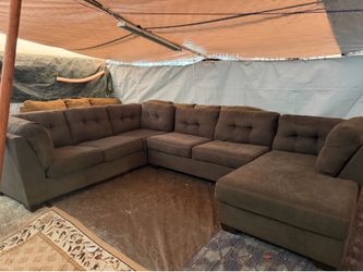 Gray couch good condition clean we saw the time delivery $40 local