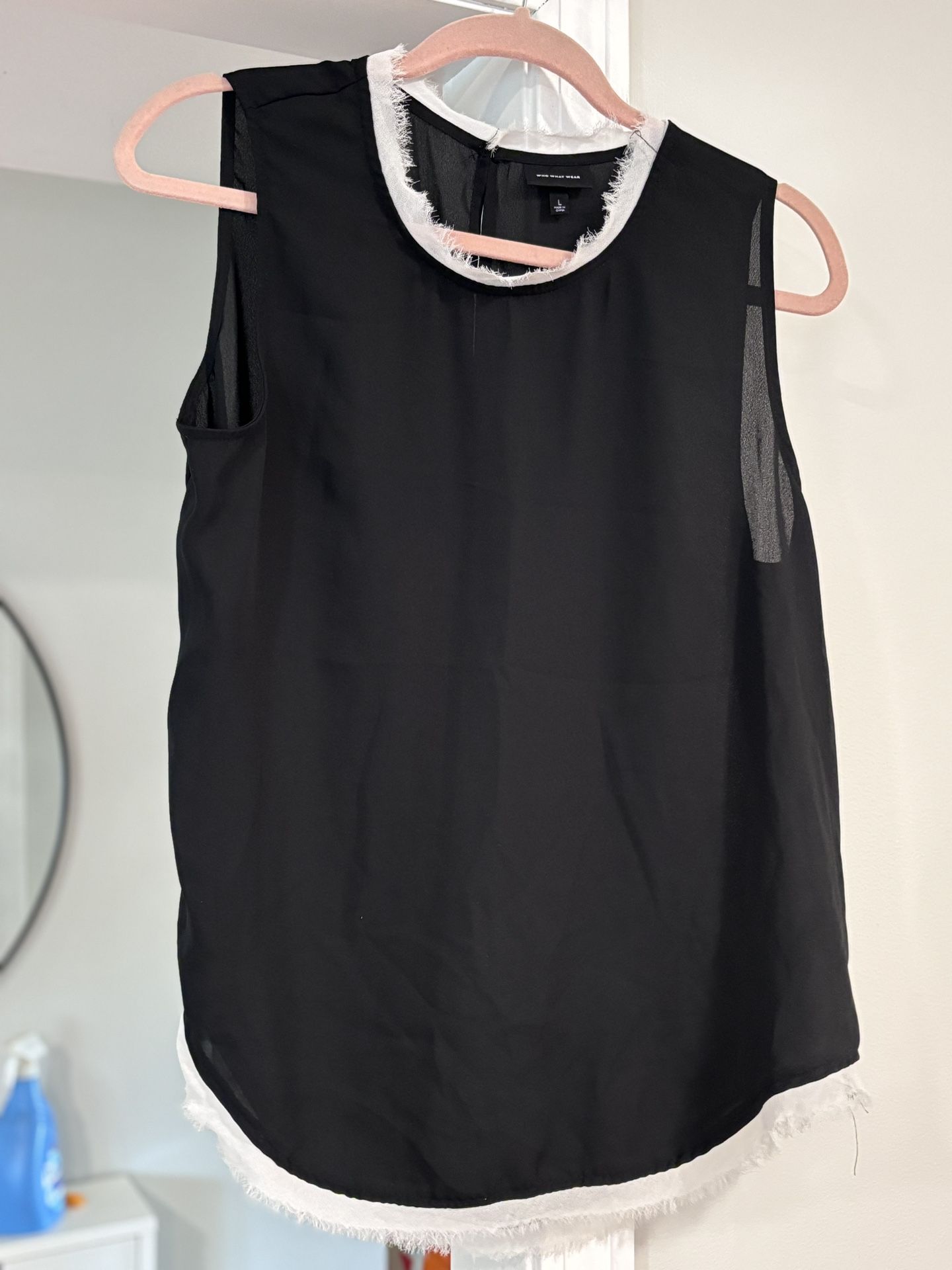 Black Sleeveless Top with White Trim