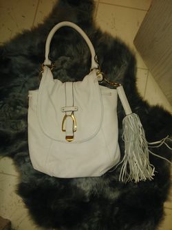 White G.I.L.I purse w/ removable tassle. 40$ i paid 190 for it off qvc.