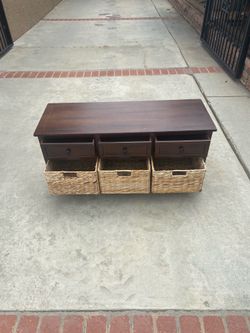 TV hutch with wicker storage