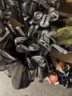 Various Wedges And Irons