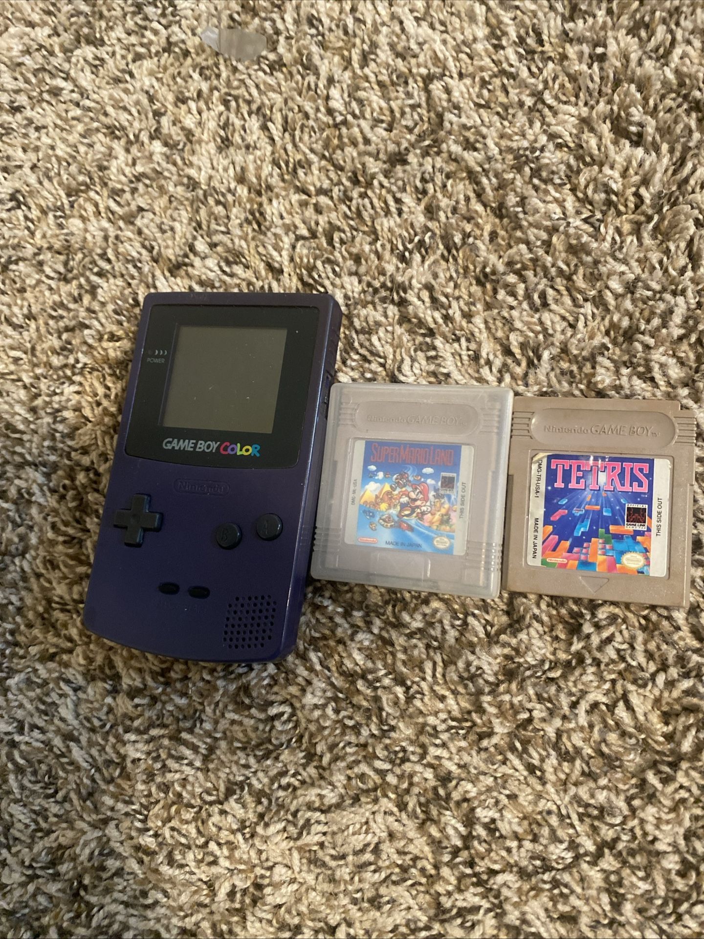 Brand new super mario land 1989 in the cartridge, with nintendo gameboy and tetris