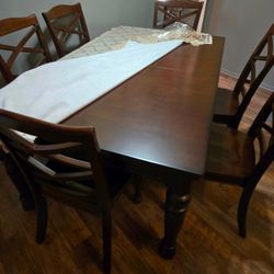 Large dining table w/6 chairs heavy solid wood Parma see pics above excellent condition.