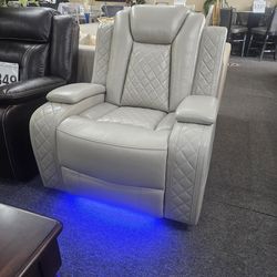 Brand new cream synthetic leather power reclining chair with BLUE LED and arm storage