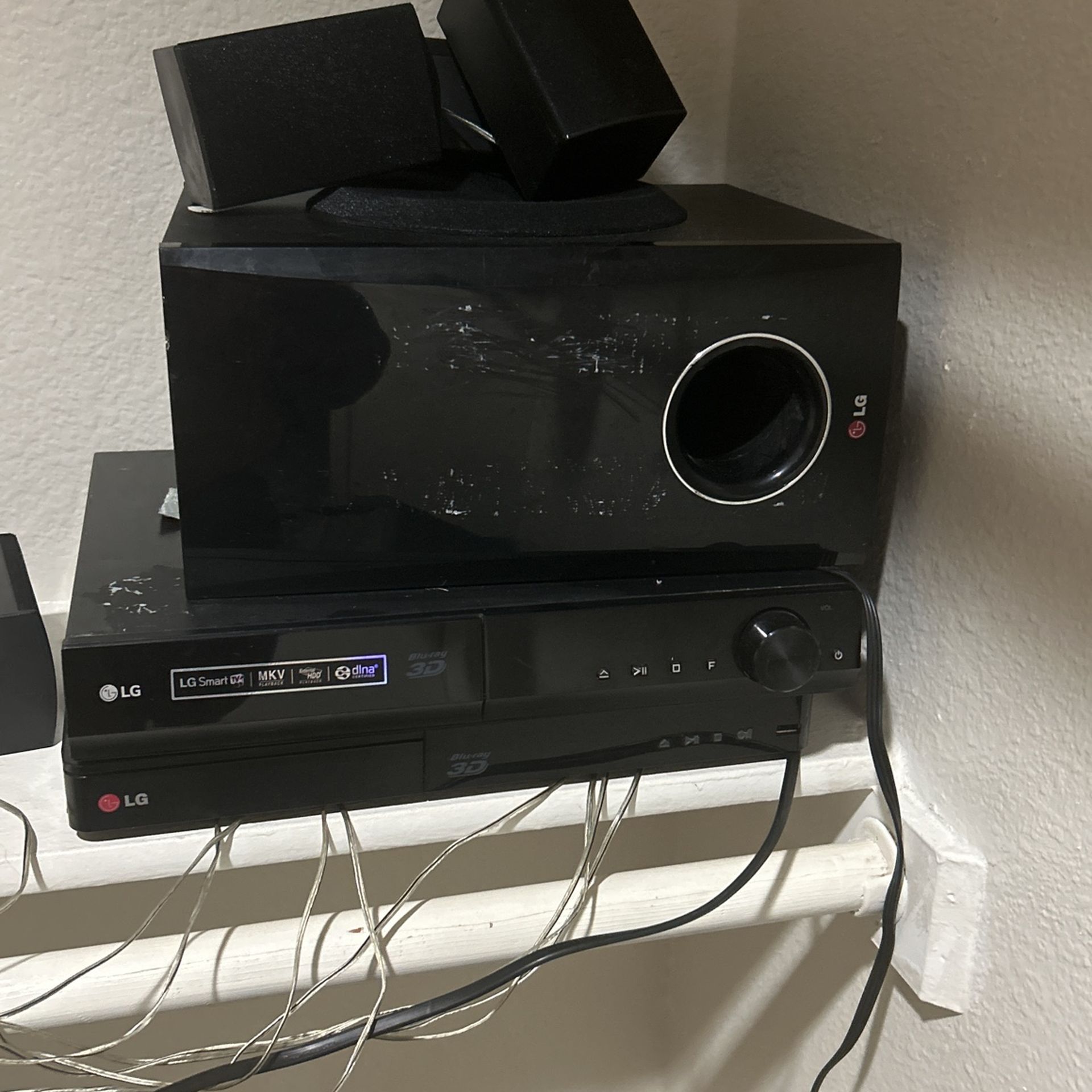 Two Dvd Players With Surround Sound