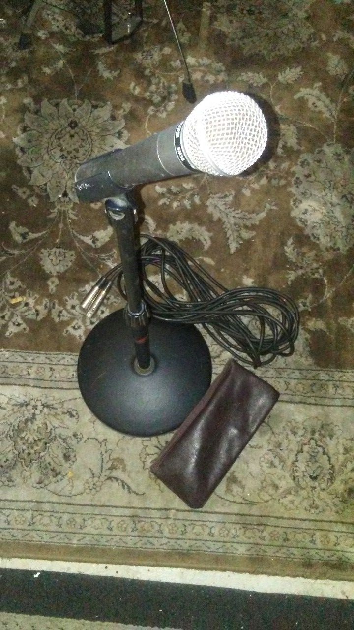 SHURE DYNAMIC SM58 VOCAL MIC. W/ AMP.MIC. STAND 85.00