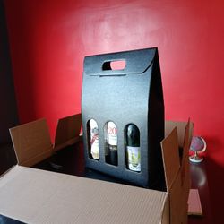 Wine Carriers, safely carry and showcase your finest vintage in elegant totes.