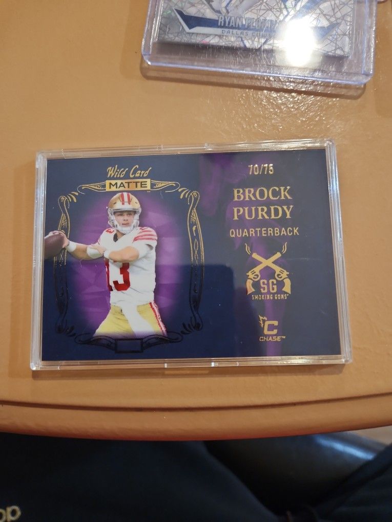 BROCK PURDY SMOKING GUNS PURPLE RC #70/75