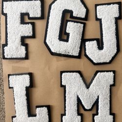 Patch letters, white and black, fuzzy carpet on felt, iron on letters.