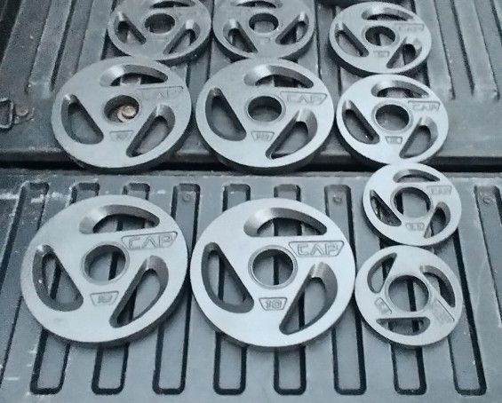 NEW OLYMPIC CAP PLATES (FOUR) 10s & 5s & (PAIR OF) 2.5s.