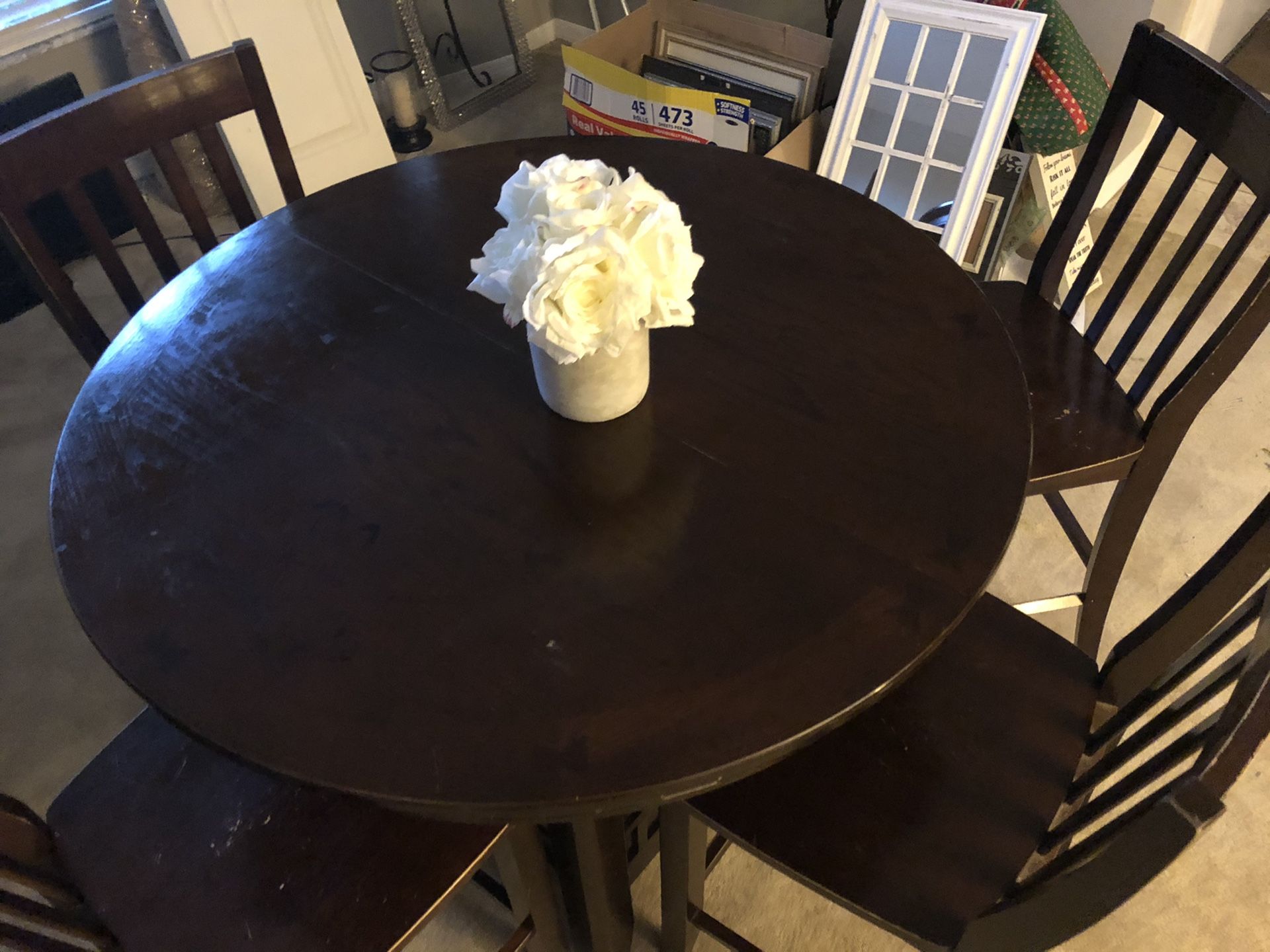 Walnut high top table with four chairs