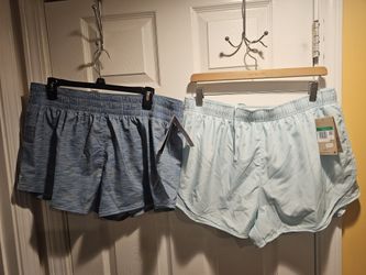 2 Pairs Of Womans NIKE shorts XL For $20