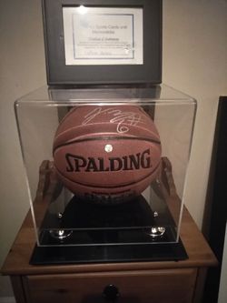 Authentic hand signed LeBron James Spalding basketball in mirrored case with certificate of authenticity