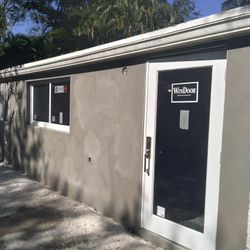 Stucco. ==  Plaster