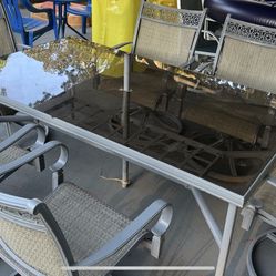 Patio Set- Offenbach Brand -Large Glass Table/ 6 Swivel Chairs/ 2 Umbrellas 