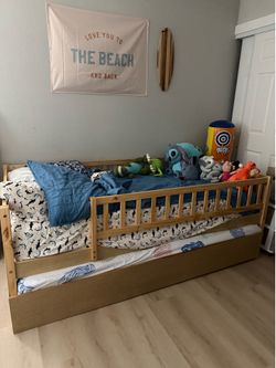 Toddler bed with trundle & w/2 twin mattresses- like new!