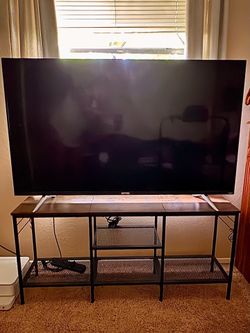 55” tcl smart roku tv with stand was in guest room