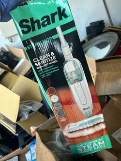Shark  ST CLEAN & SANITIZE WITH Just WATER.