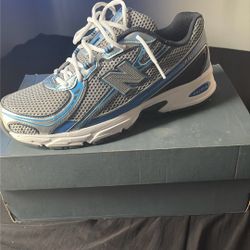 Gray Blue New Balance/ Sizes 10/2