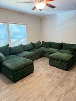 Large Green Modular Sectional Sofa with Ottoman