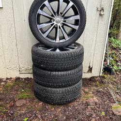 Rims with snow studded tires 18”