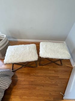 2 White Fuzzy Ottomans