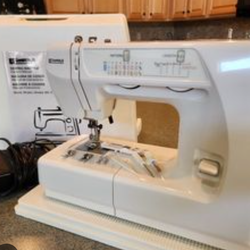 Kenmore 1(contact info removed) almost new sewing machine with everything and case