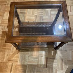 Solid wood and glass top coffee table.