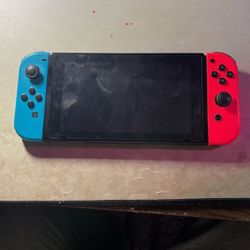 Nintendo Switch W/ Super Smash Bros Ultimate