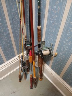 Vintage fishing poles and reels