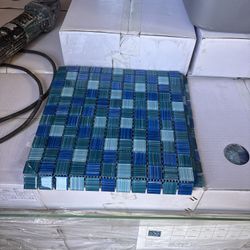 12x12 glass Tile  liquidation price $6 Sqft $22 retal  nobody  beat my prices   1936 Hinton Dr Irving Tx   I have several styles to choose from   
