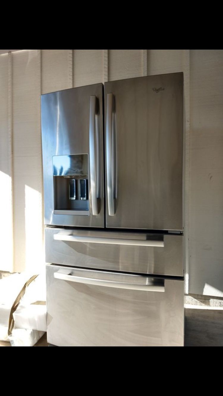 Whirlpool refrigerator almost new barely used