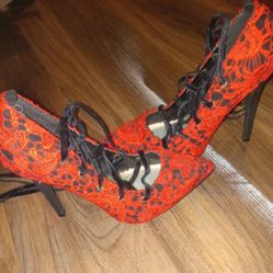 Red strappy high heels size 7 unique embroirdery and only used once
