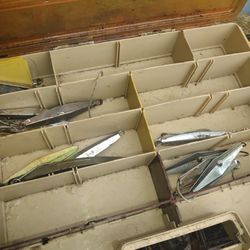 tackle box with some fishing lures