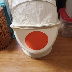 Child's Covered Rotating Chair