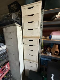 3- white garage cabinets