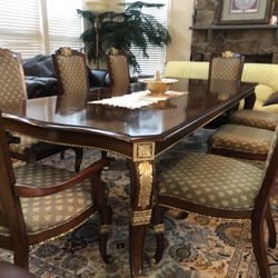 Beautiful Dining Table With 8 Beautiful Dining Chairs.