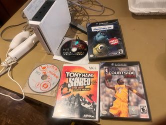 Nintendo Wii w controllers and games