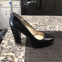 Black Michael Kors shoes with silver trimming