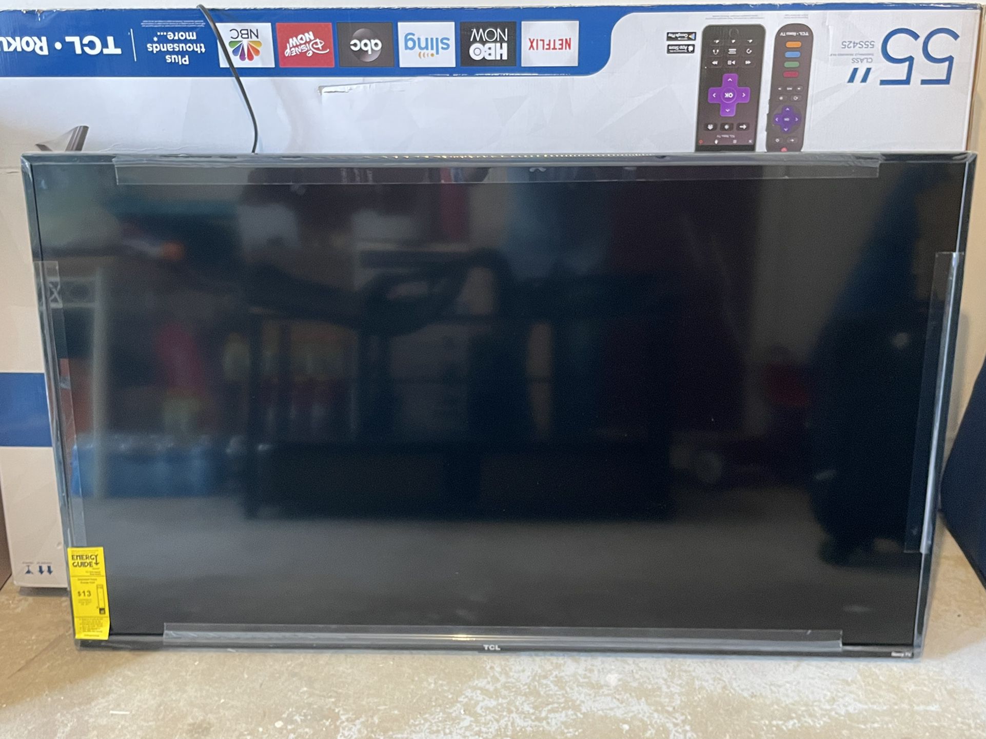 Like New - Excellent Condition 55’ Roku TCL TV Plus a new TV Stand
