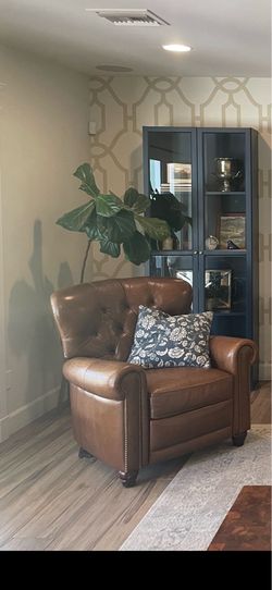 Tufted leather recliner