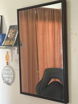Black frame mirror.
