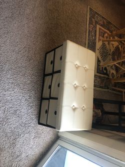 Ottoman with storage drawers