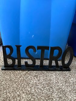 black decorative tabletop Wooden"BISTRO" sign featuring block letters mounted on a rectangular base